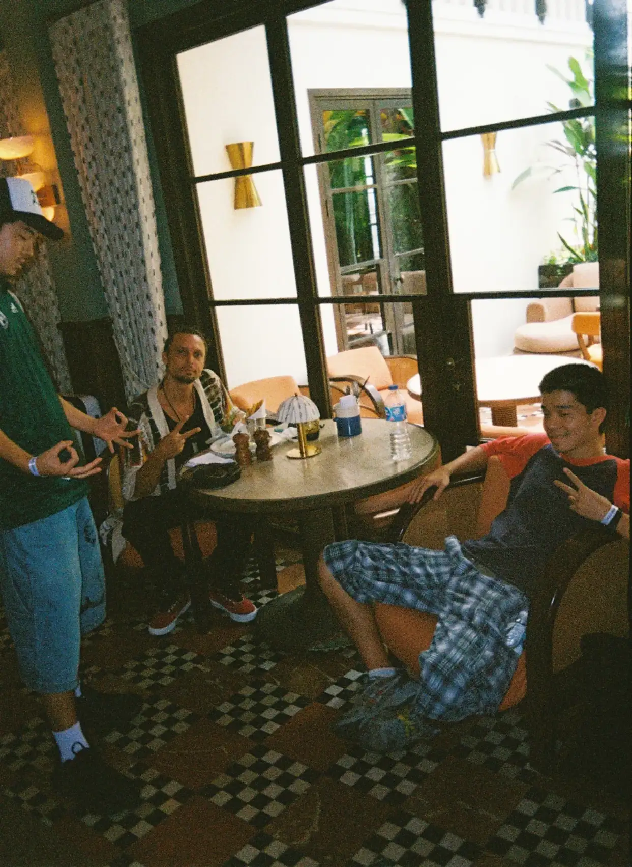 Zambug, Alec Orachi, and Nyaryan from Culcha Collective chilling